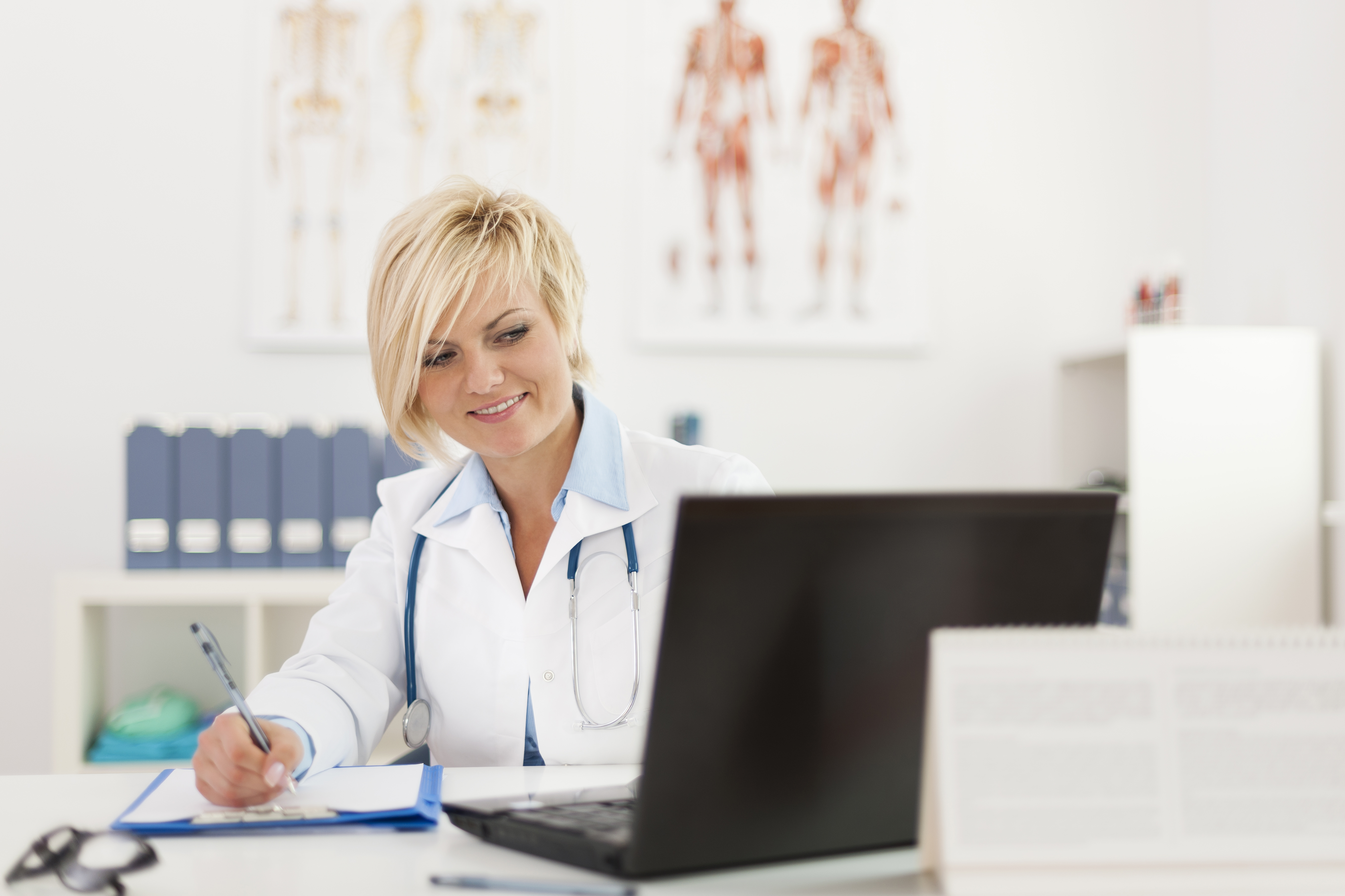 blonde-beautiful-female-doctor-working-her-office.jpg